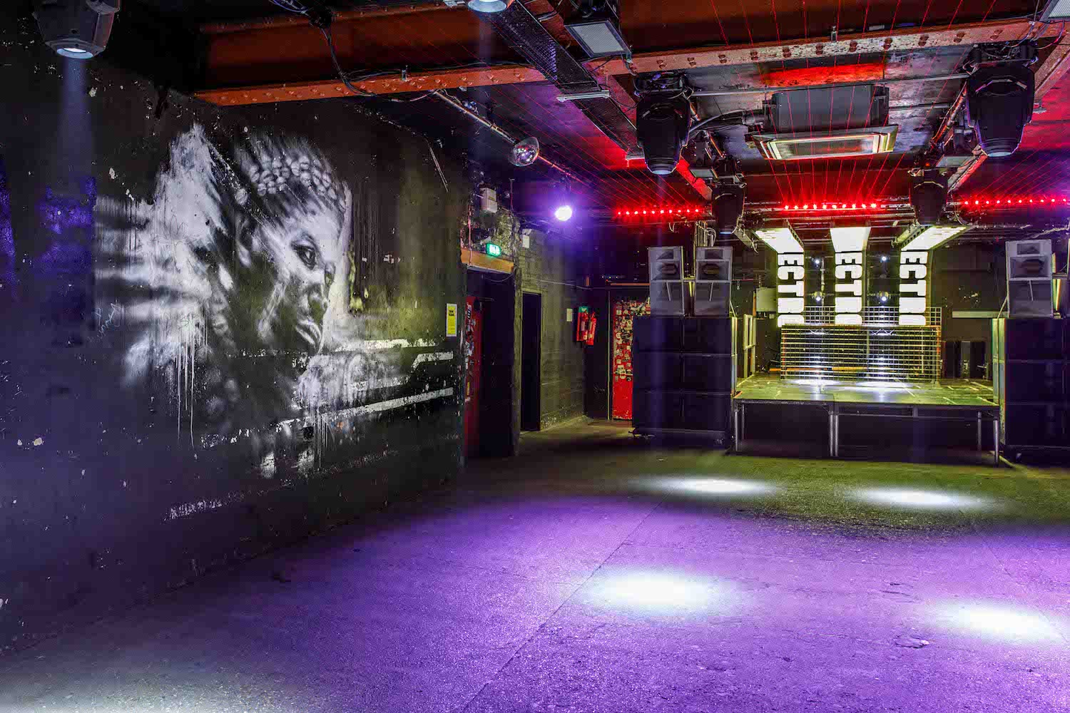Industrial venue, graffiti art, urban event, concert