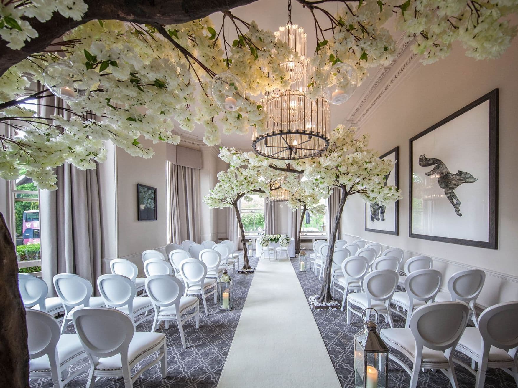 Elegant wedding venue with chandelier and floral arrangements in The Milner York.