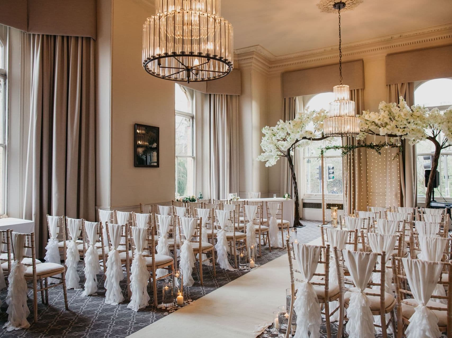 Elegant wedding venue with floral arch and romantic lighting in The Milner York.