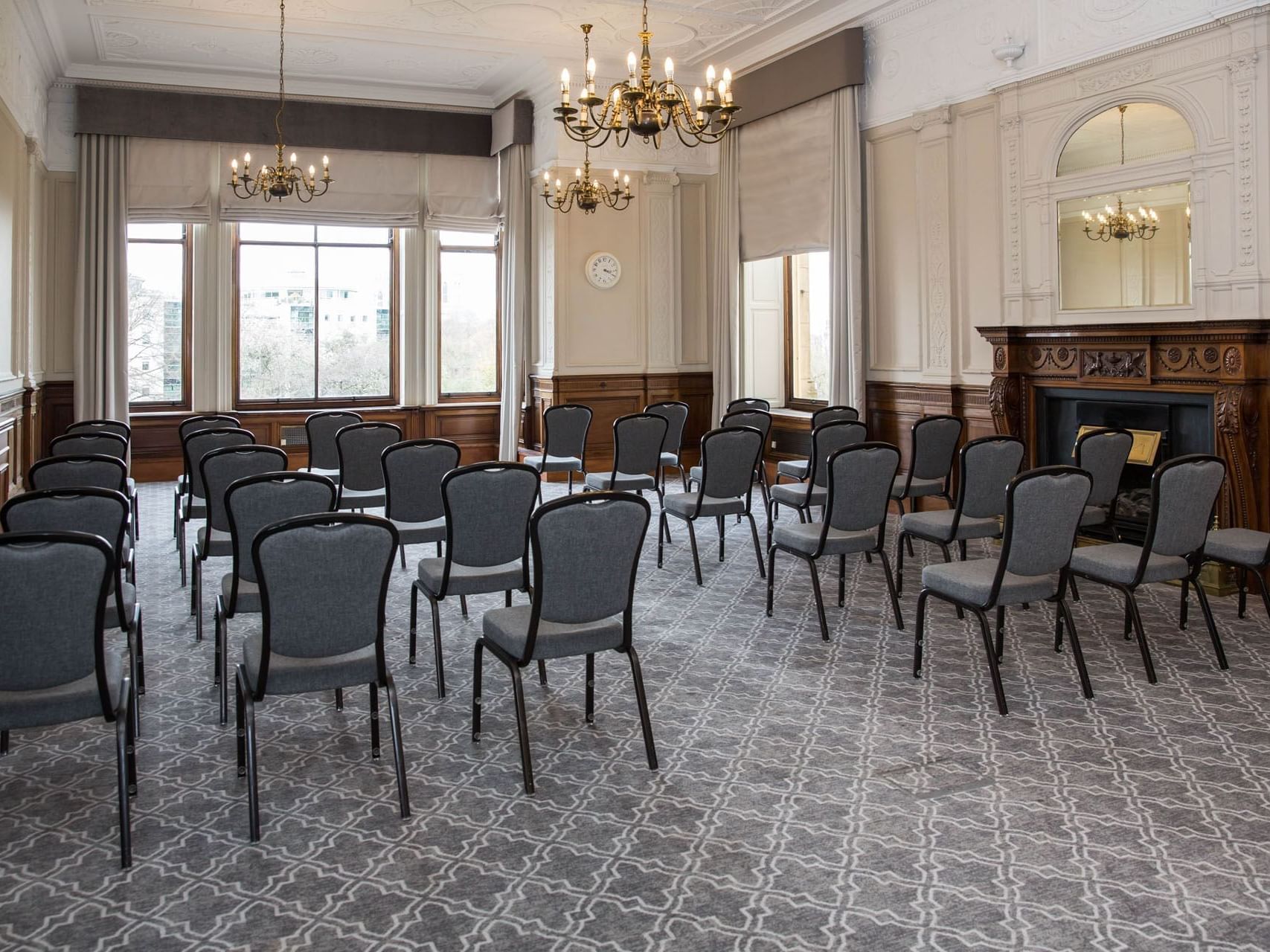 Elegant meeting room with arranged chairs for corporate events and seminars.