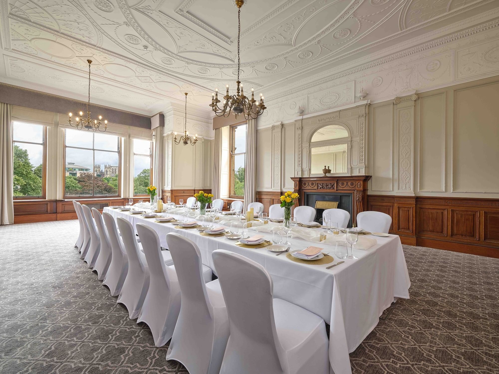 Elegant meeting room at Wedgewood, featuring fine tableware for upscale conferences.
