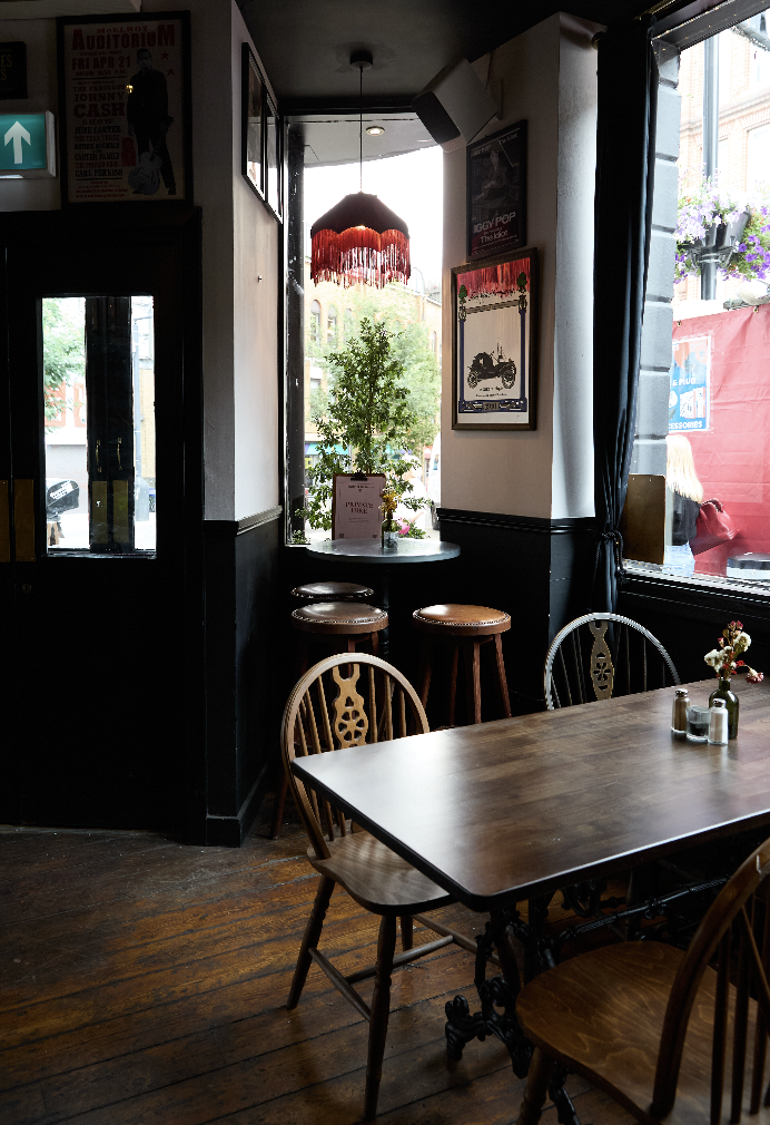 Cozy Main Bar in The Islington Townhouse, perfect for workshops and networking events.