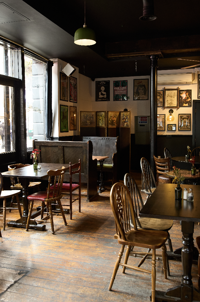 Cozy Main Bar at The Islington Townhouse, perfect for intimate gatherings and meetings.