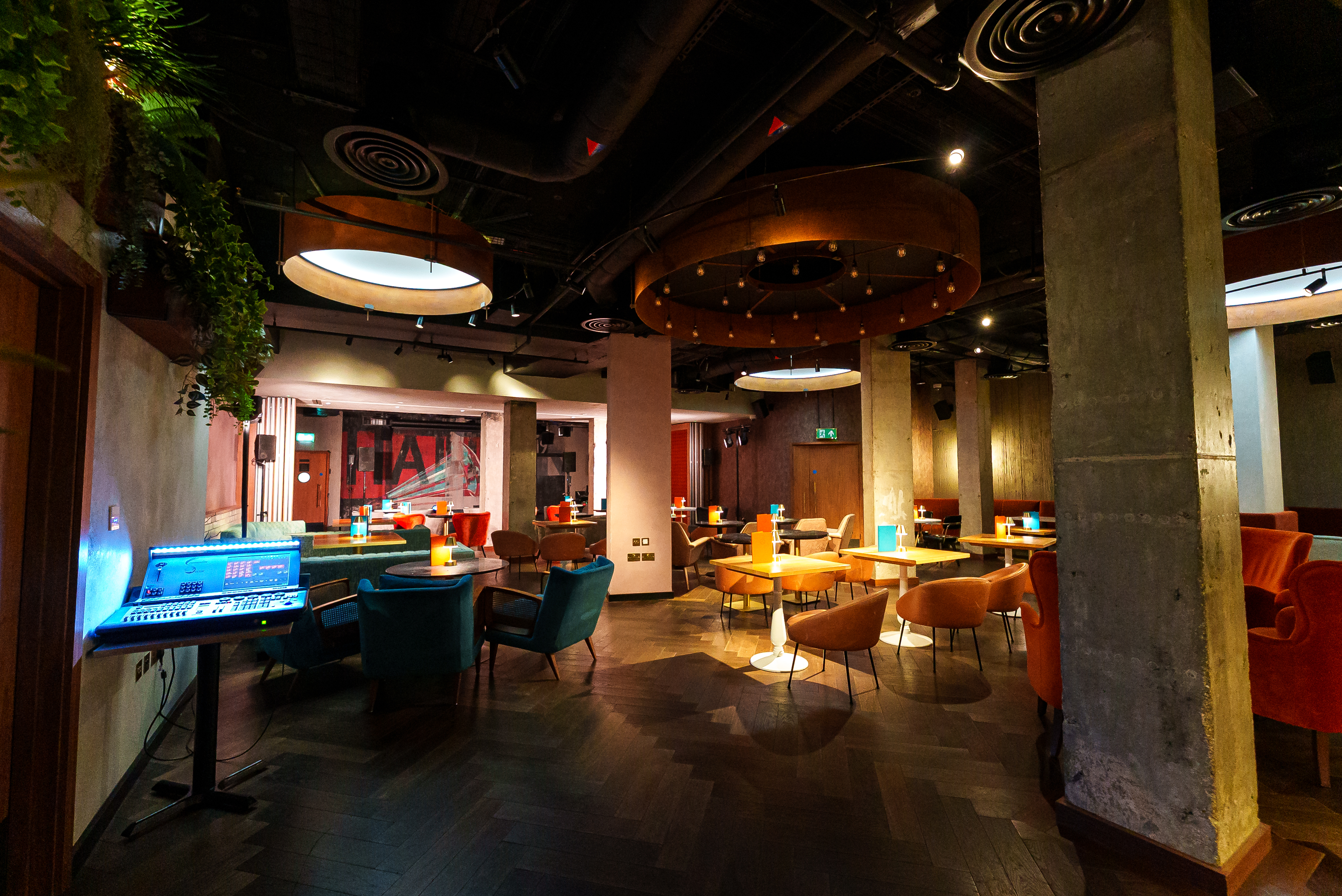 QT Basement Bar at Middle Eight, modern decor for cocktail receptions and small conferences.