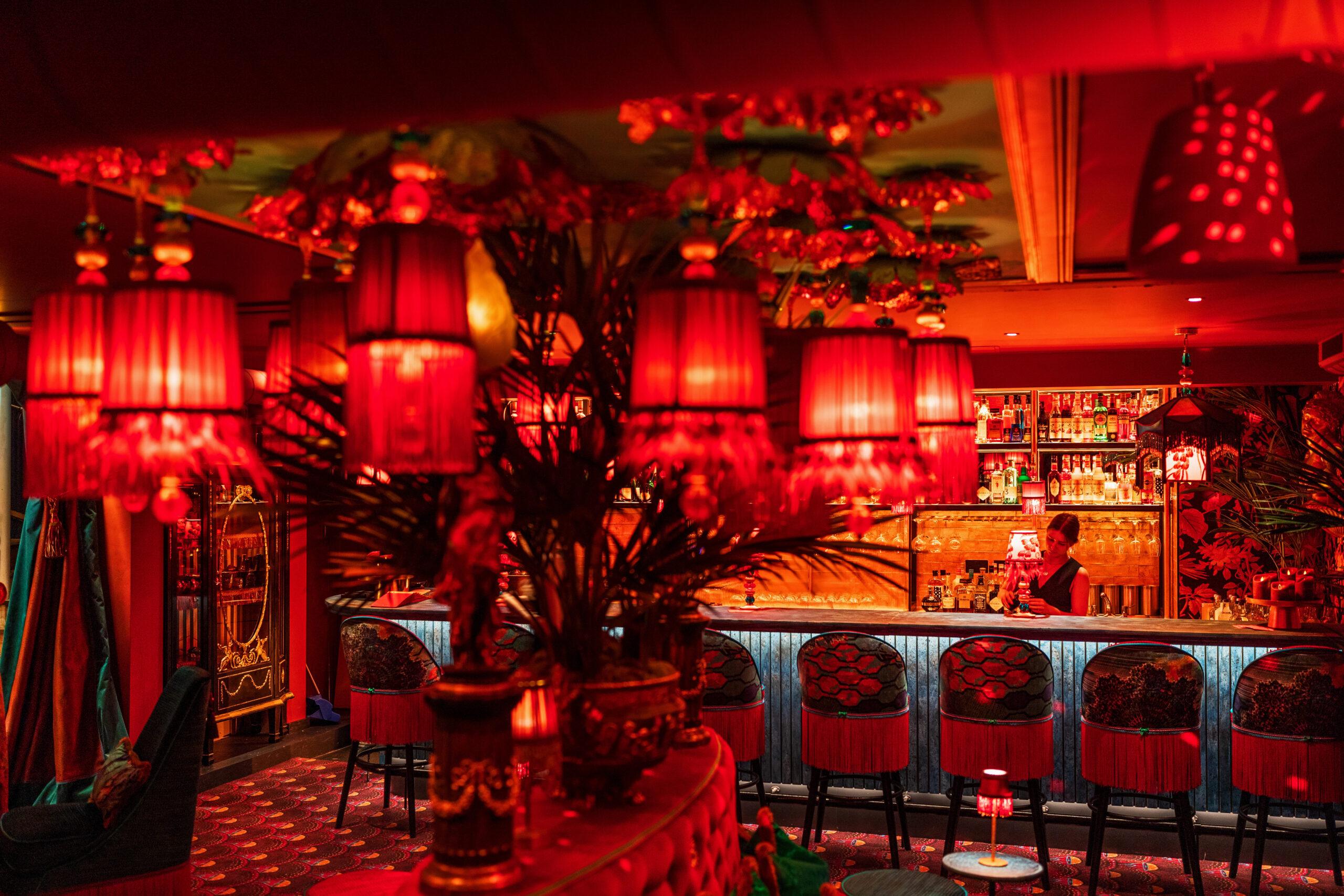Inviting venue hire at Zum Barbarossa with cozy red lighting for intimate gatherings.