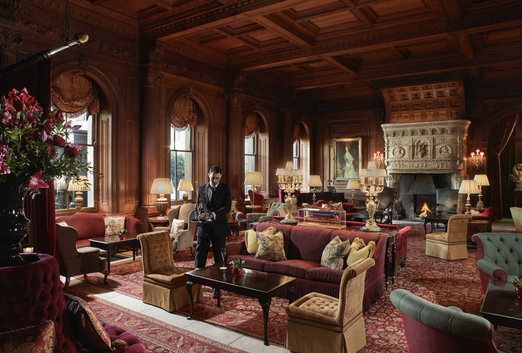 Opulent meeting space at Cliveden House with rich wood paneling, perfect for events.