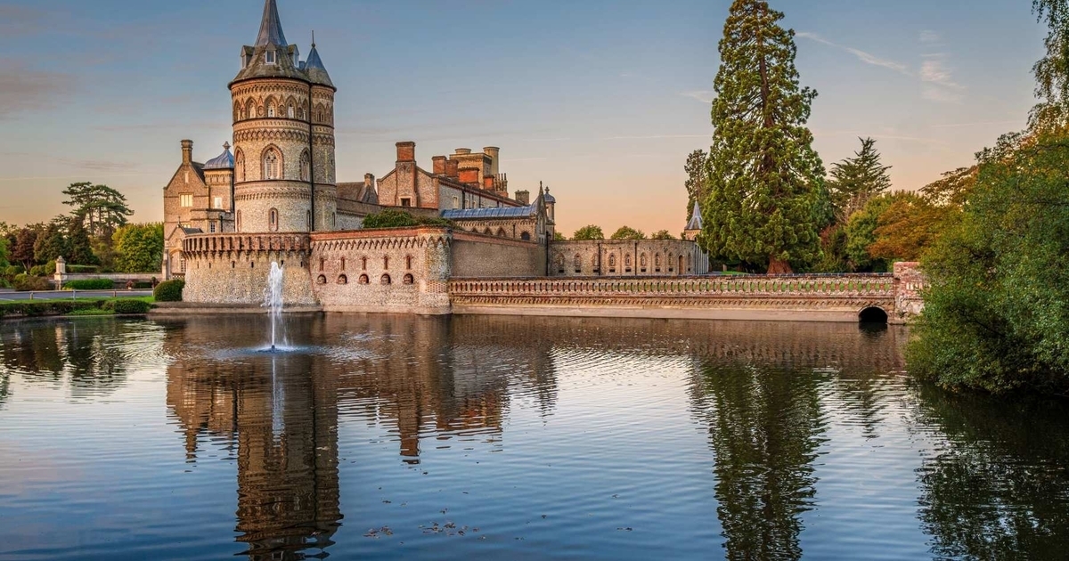 "De Vere Horsley Estate castle reflection, ideal for corporate events and weddings"