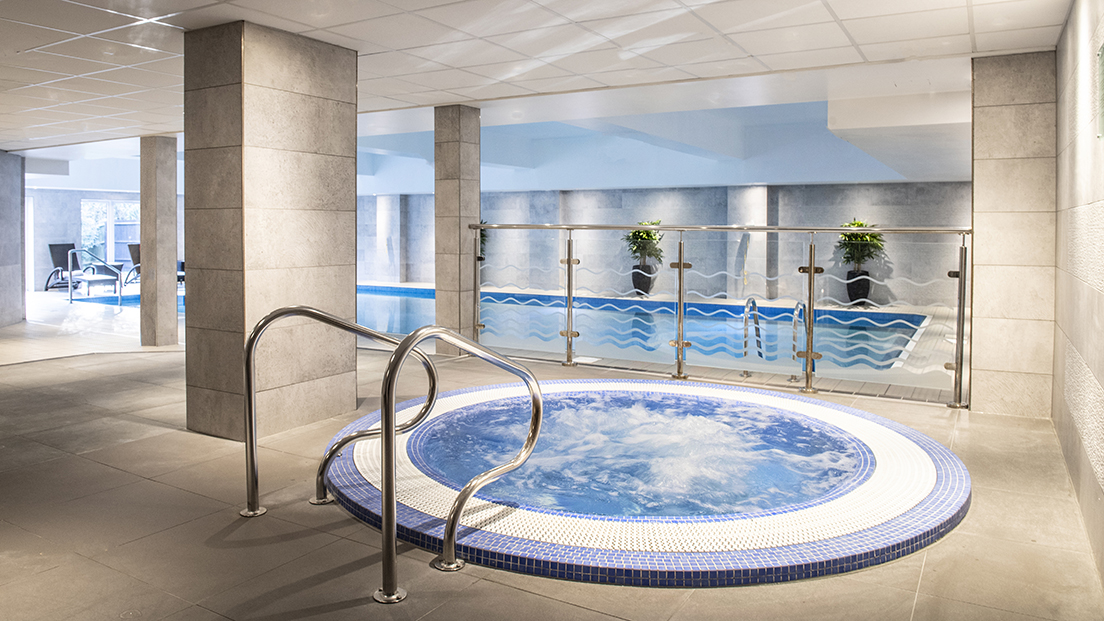 "Nutfield Priory Spa overview with jacuzzi and pool for corporate retreats"