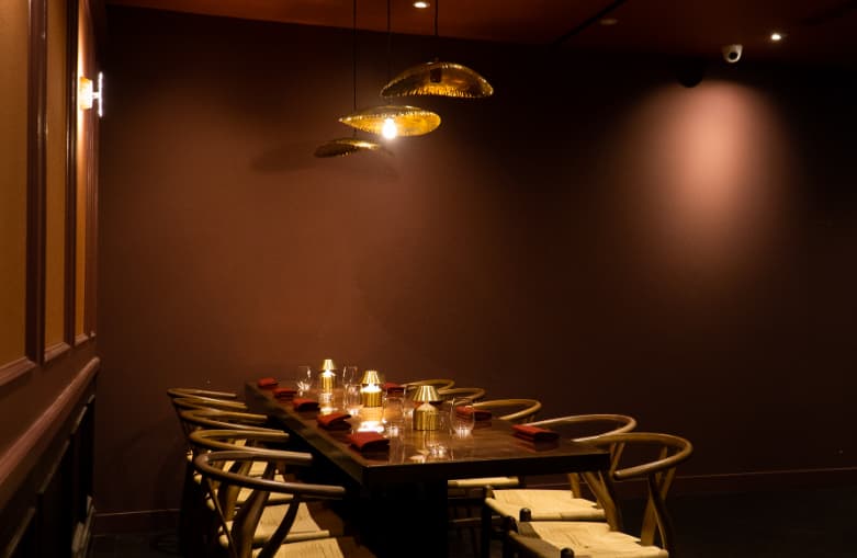 Intimate Shakara private dining room with ambient lighting for board dinners and networking events.