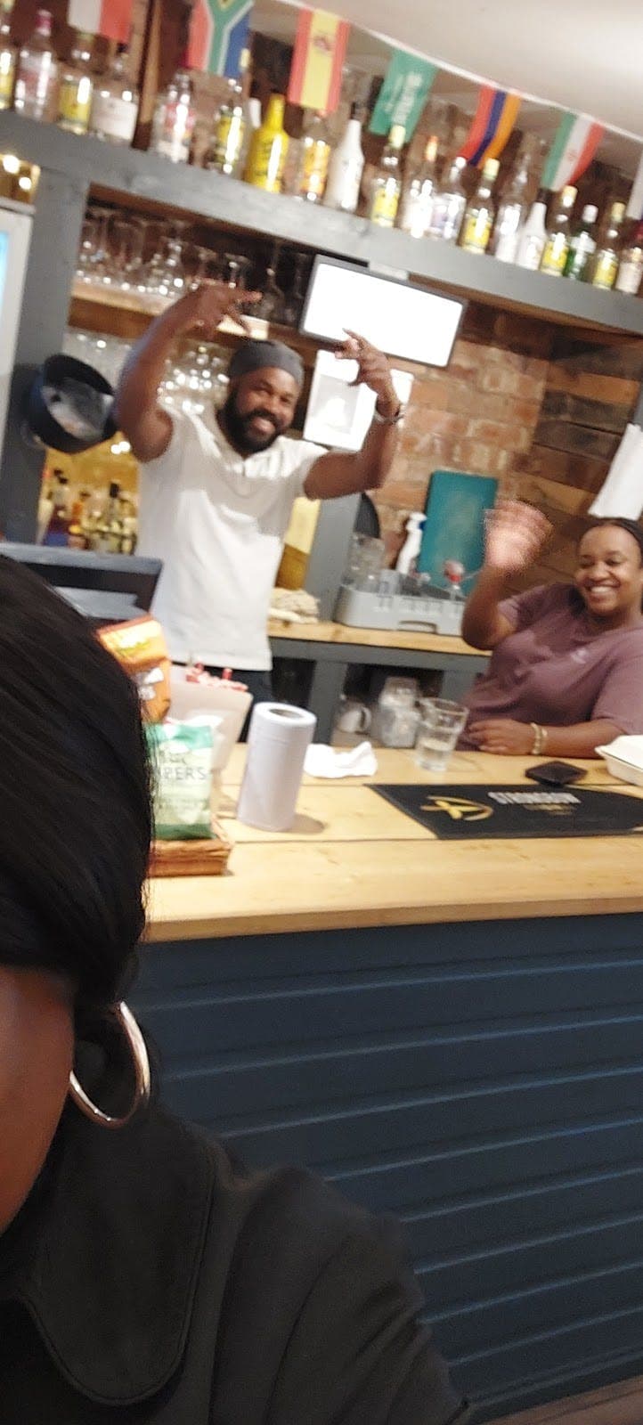 Friendly staff at Bennetts Reggae Lounge providing exceptional event hospitality and service.