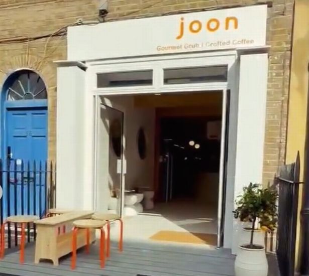 Cozy boutique cafe pop-up event space, ideal for intimate catering and brand activations.