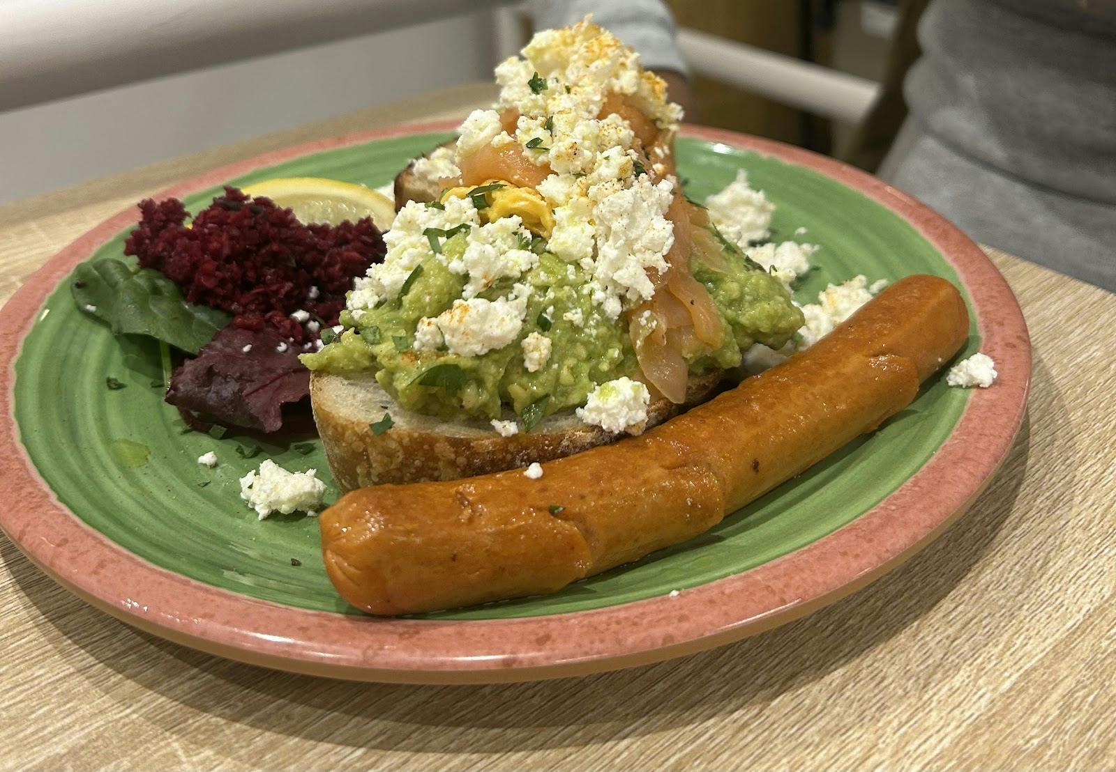 Sausage and avocado toast at Joon Cafe event; poor catering and allergen labeling display.