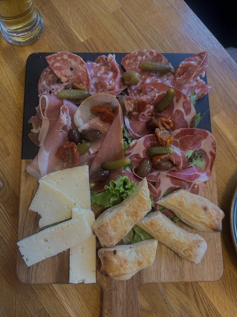 Premium charcuterie board for corporate catering and networking events at Pecorino Restaurant.