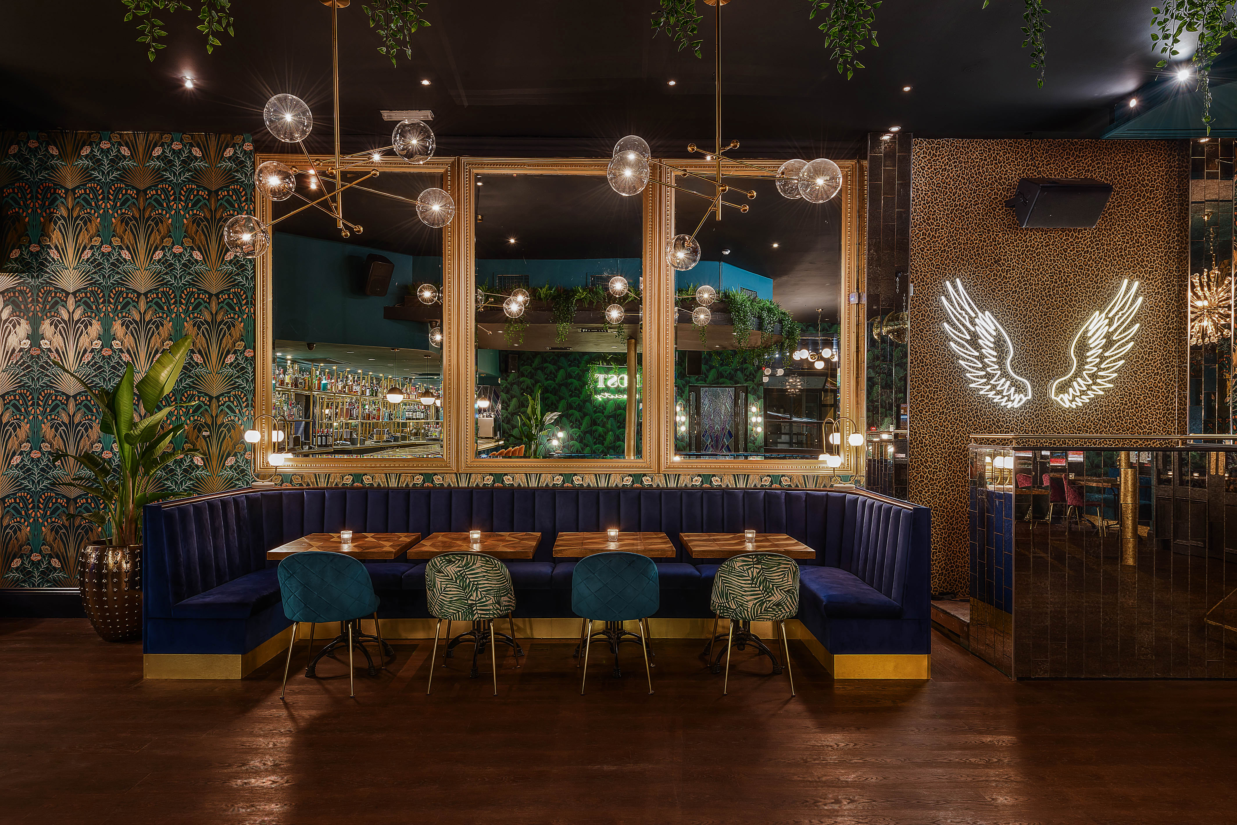Whole Venue in Lost Society: stylish dining space with blue booths for elegant events.