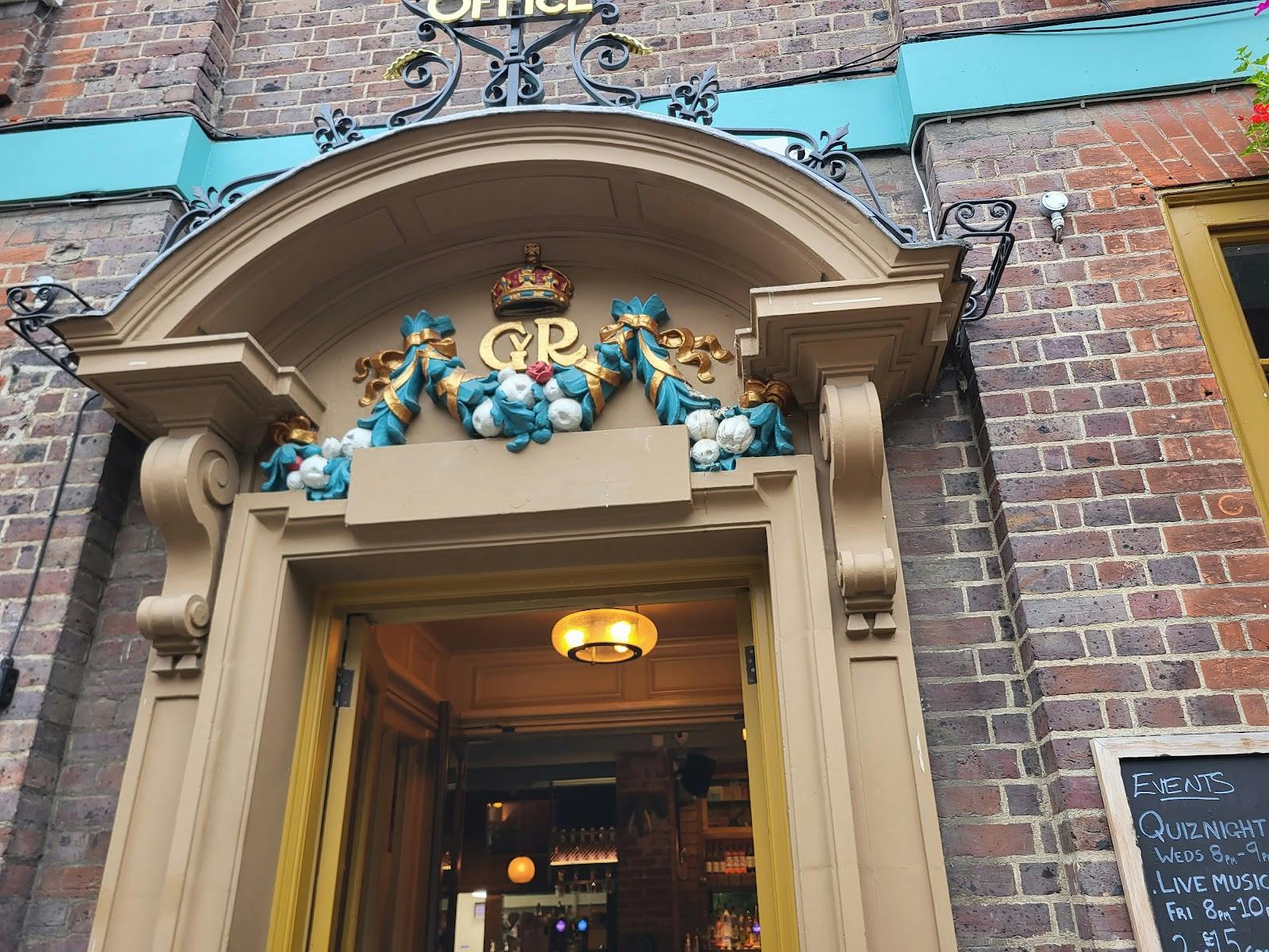 Historic pub entrance at Eltham GPO, perfect for private events and group gatherings.