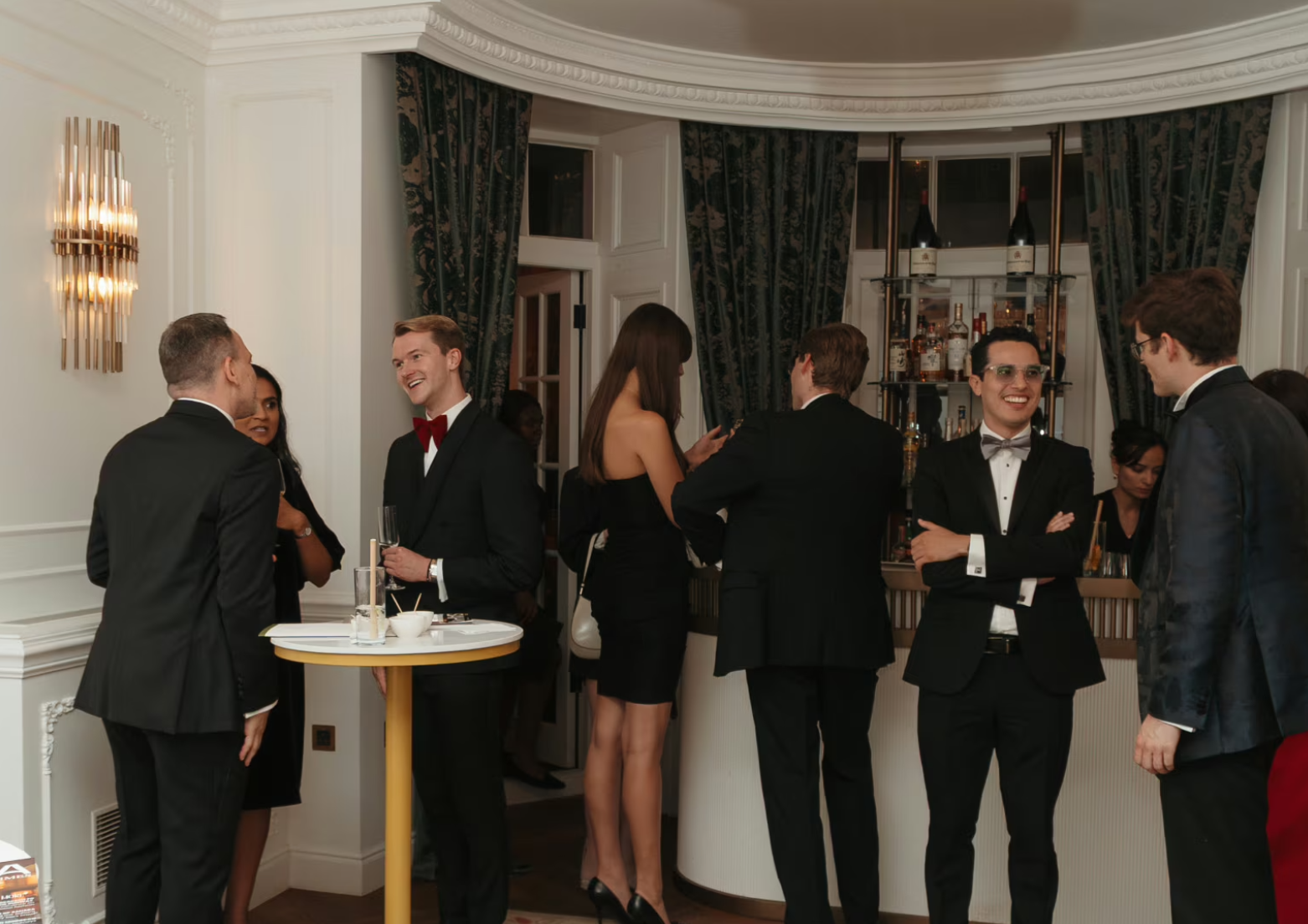 Elegant networking event at Chesham Hotel Belgravia with formal attire and inviting decor.