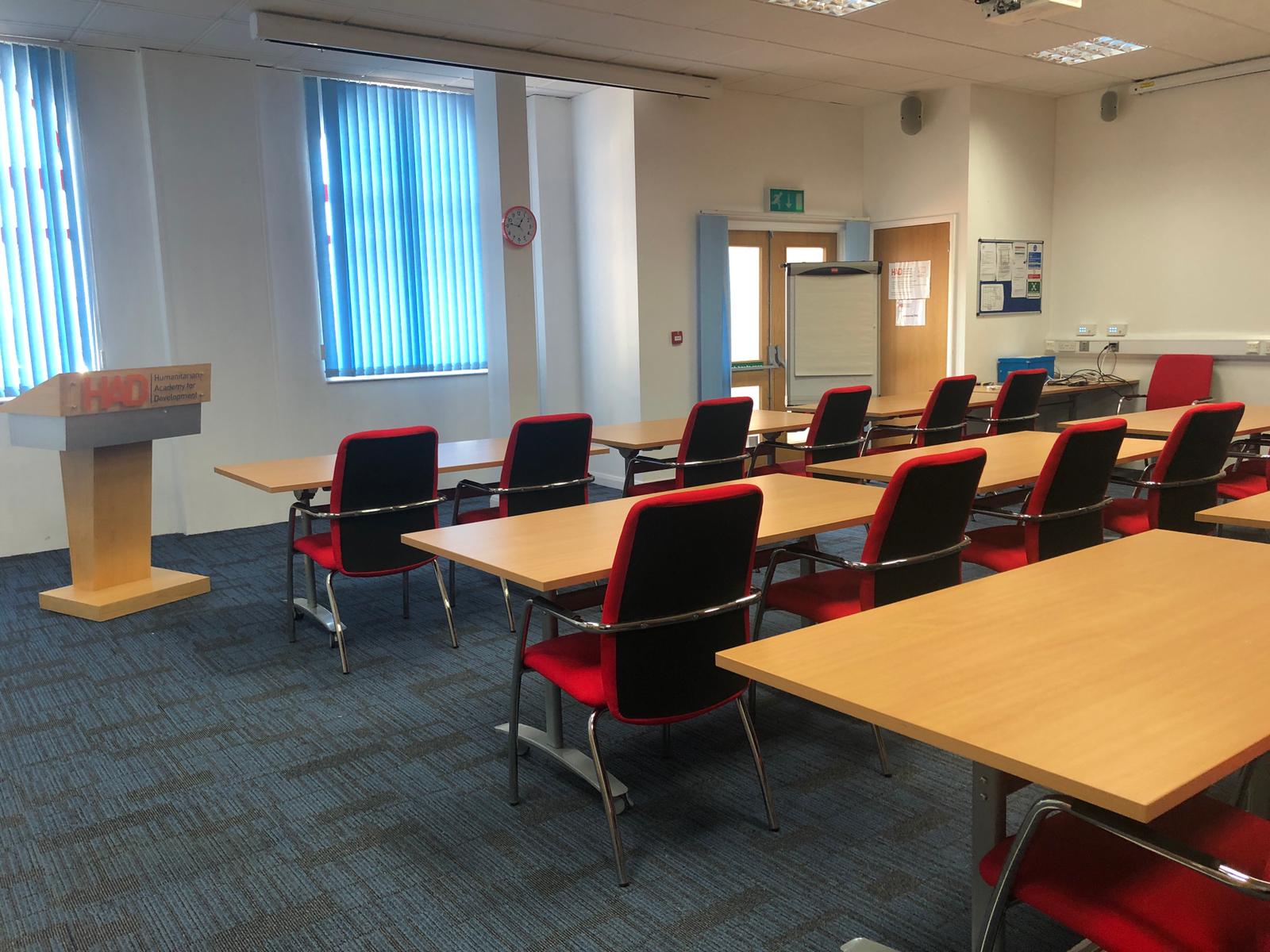 Classroom-style meeting room at New Life Wesleyan Church for workshops and training events.