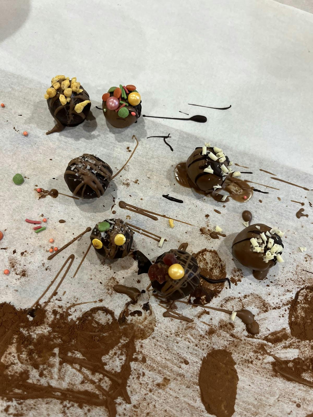 Messy dessert station at a vintage tea party workshop event for catering services.