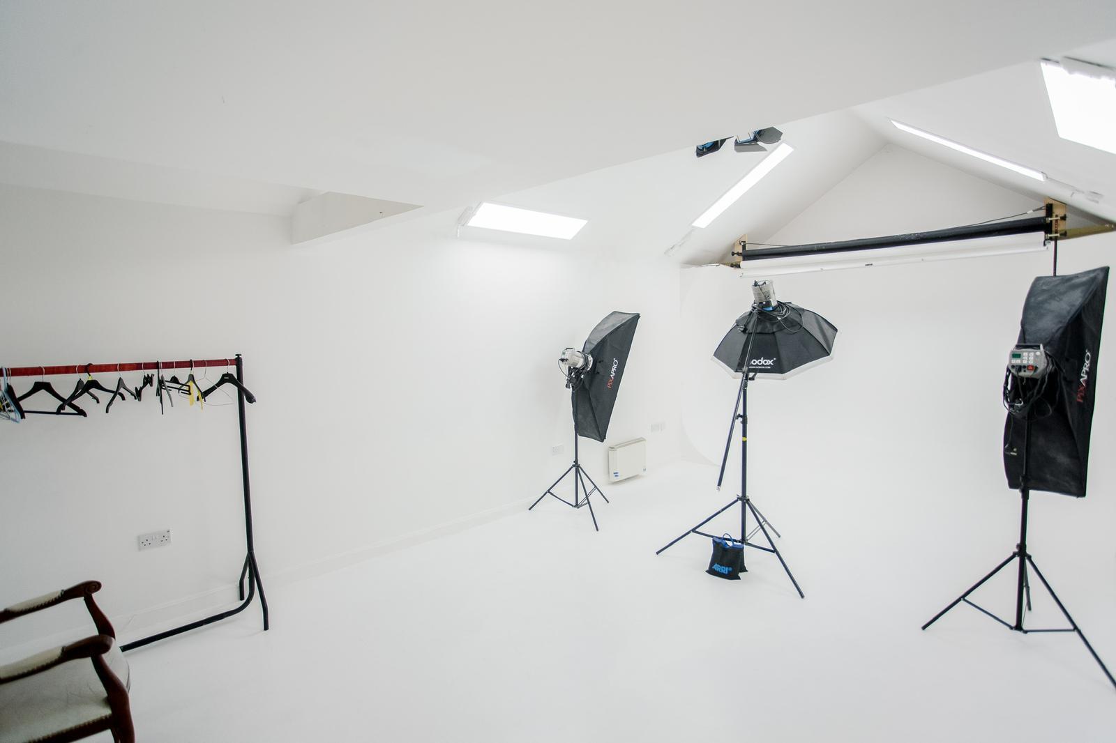 All-white photography studio at AFFilms, perfect for photoshoots and workshops.