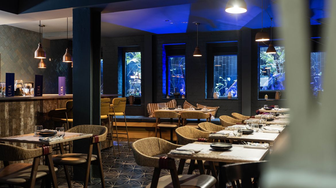 Modern dining space at El Bar, Lima - ideal for corporate dinners and intimate events.