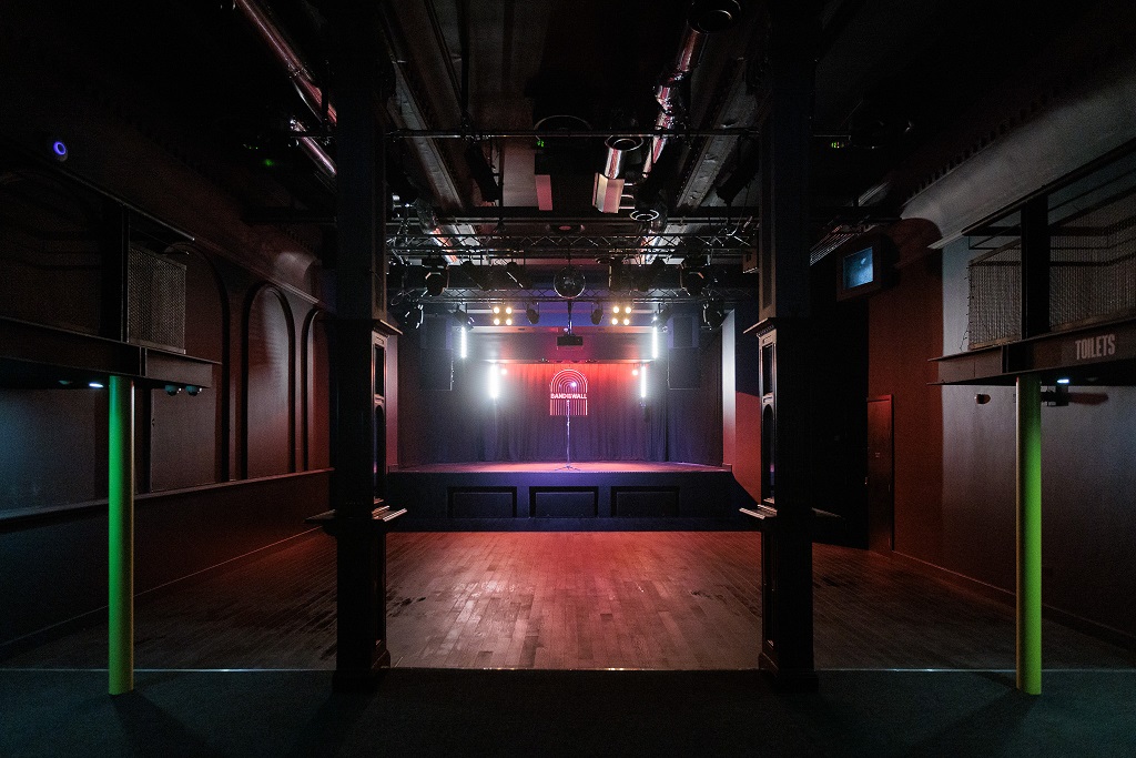 Band on the Wall black box concert hall with stage, ideal for live music and corporate events.