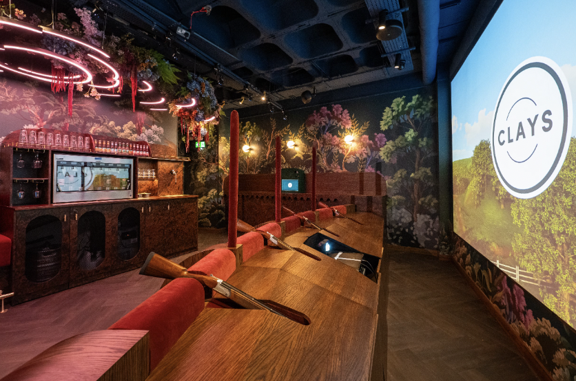 Vibrant hybrid event space with rustic decor for corporate events and team-building.