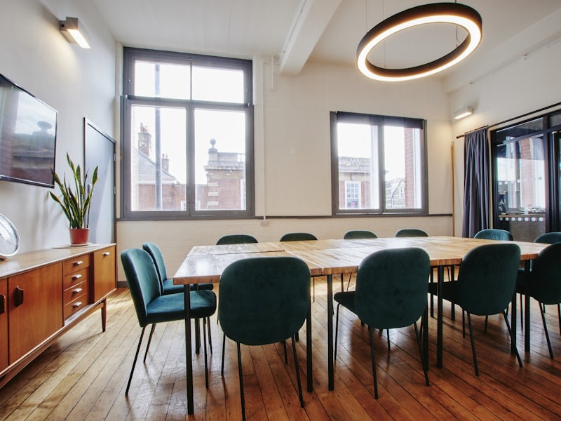 Nisbet Meeting Room with natural light, ideal for client workshops and strategic planning sessions.