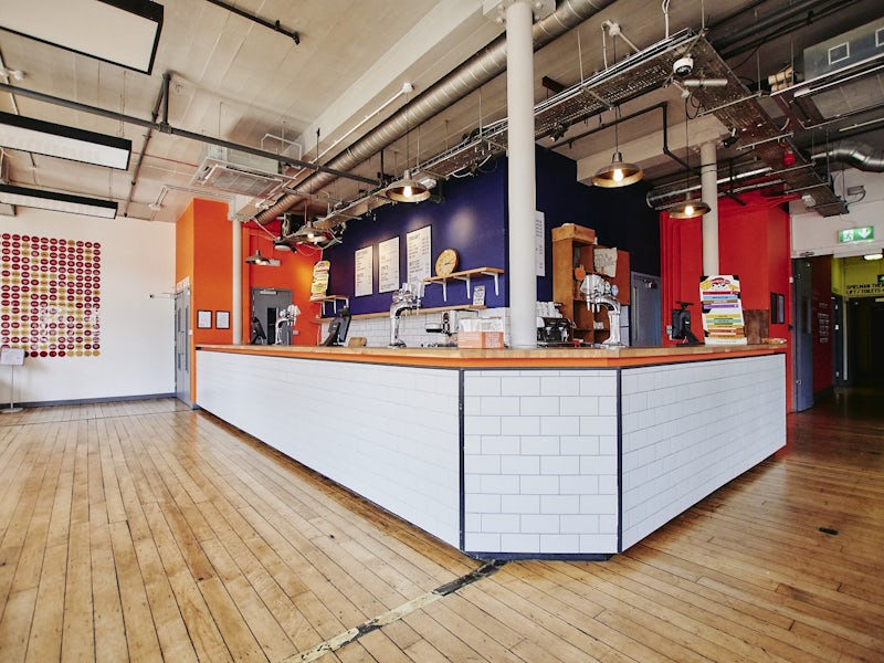 Industrial Theatre Bar venue, perfect for corporate networking receptions and event registration.