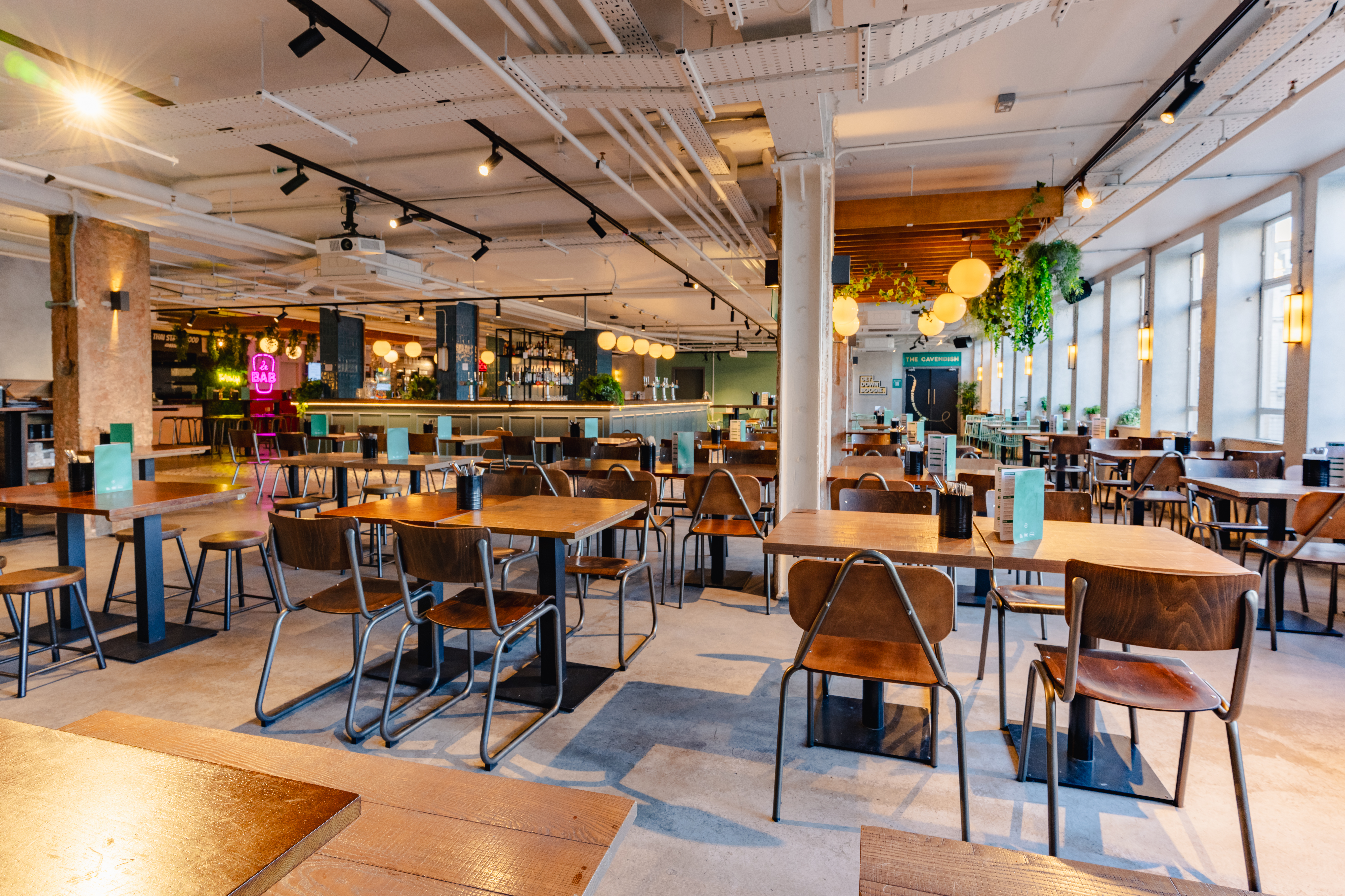 Versatile event space with modern decor for hire in Market Halls Oxford Street.