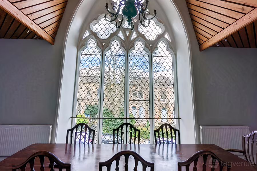 Elegant meeting room with grand arched window for corporate events at Future Leap Clifton.