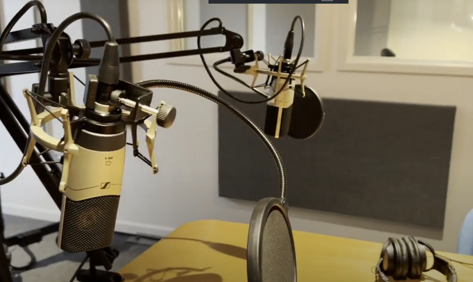 Podcast studio with professional microphones for high-quality virtual events and recordings.
