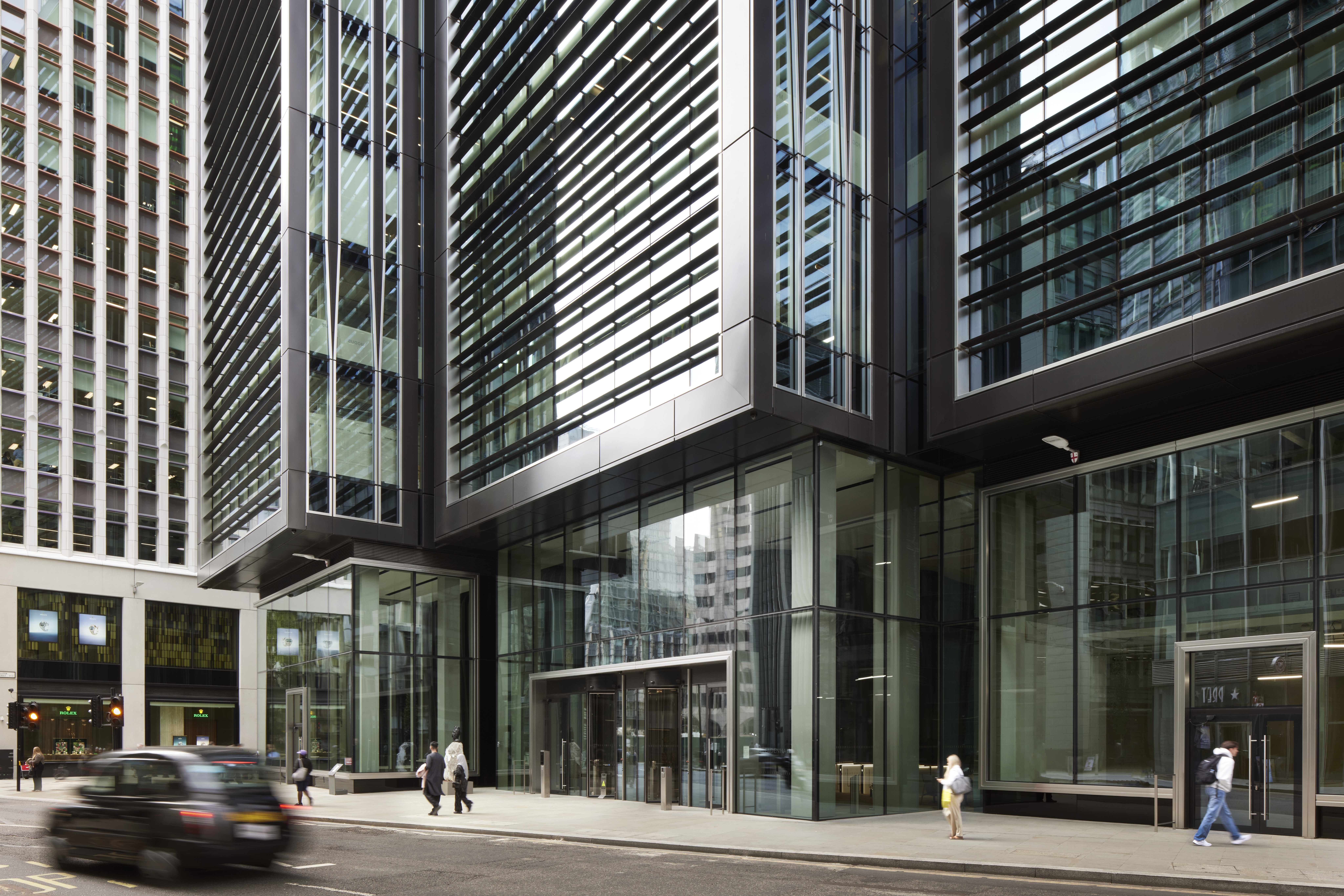 Modern glass facade event suite ideal for corporate meetings and conferences.