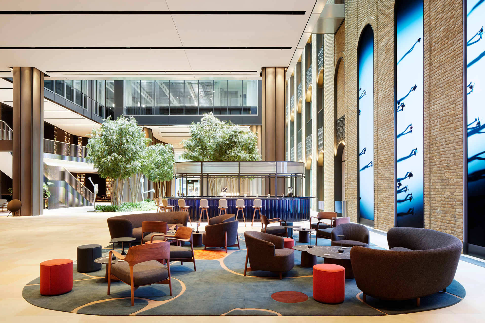 Stylish Forum Event Suite lobby with seating for meetings and gatherings.