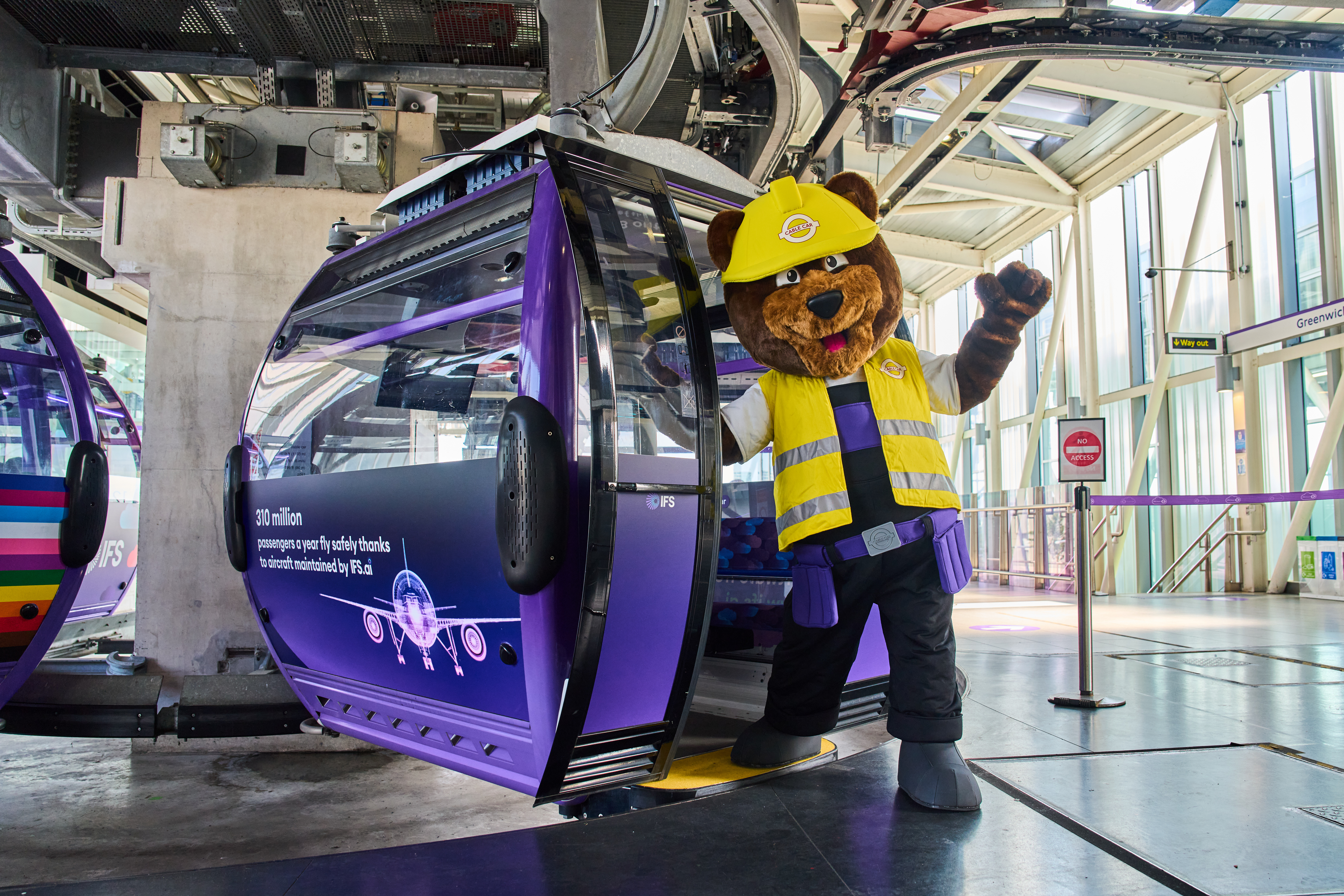 Cable Car Cabin in London with bear mascot for fun events and team-building activities.