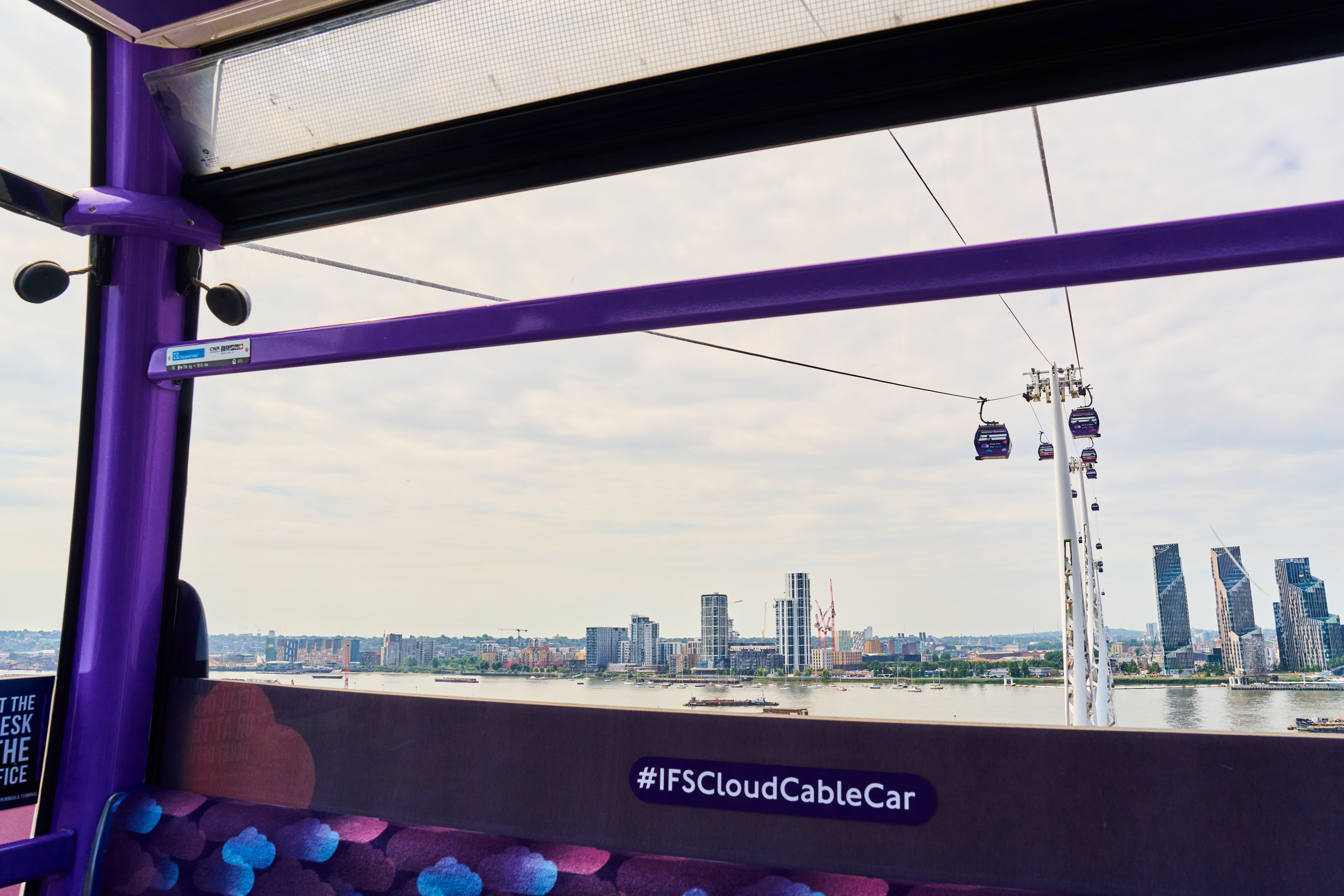 "London Cable Car cabin with panoramic skyline views, perfect for events and conferences."