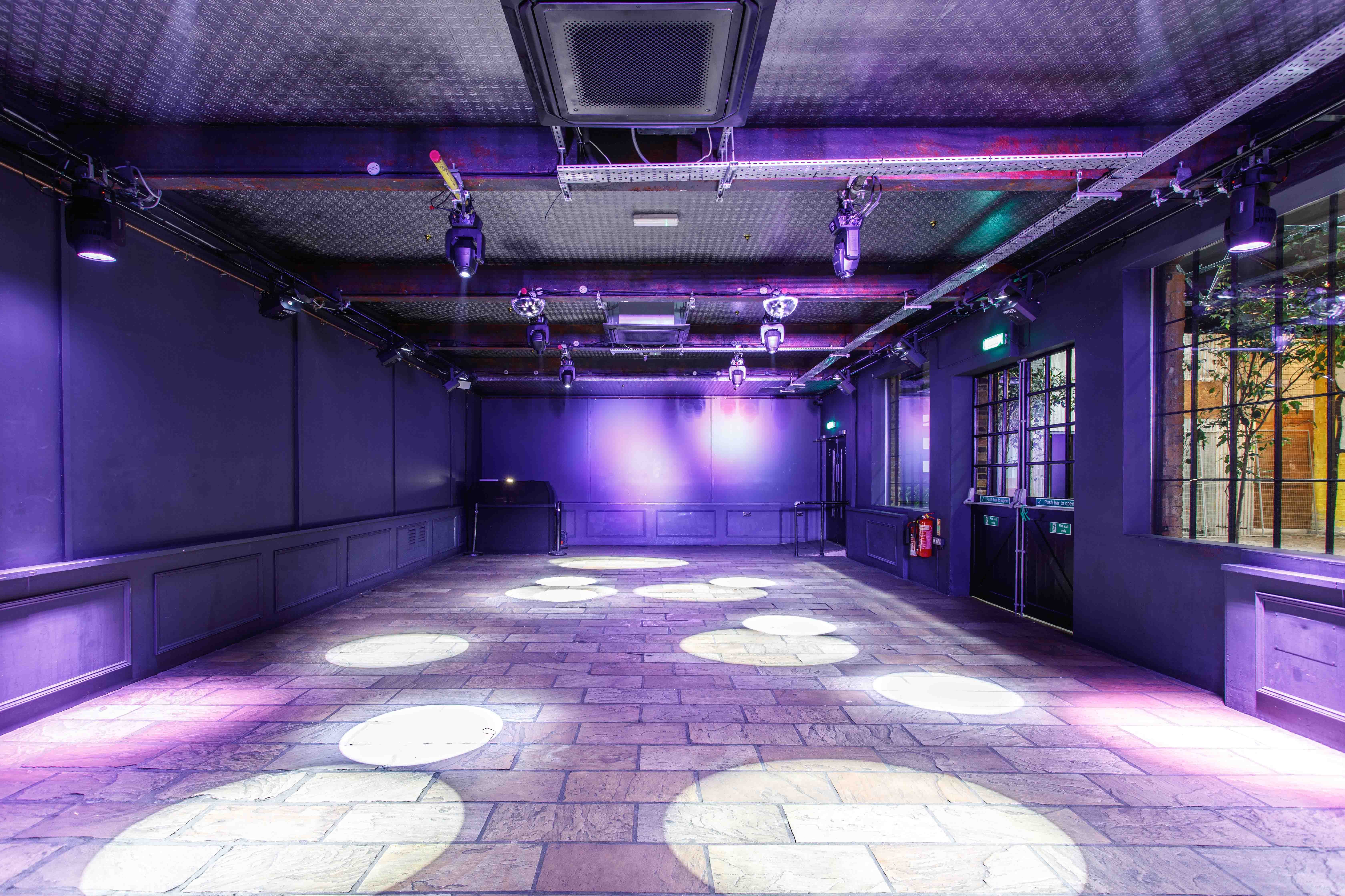 Versatile event space at Electrowerkz with modern lighting for corporate and social events.