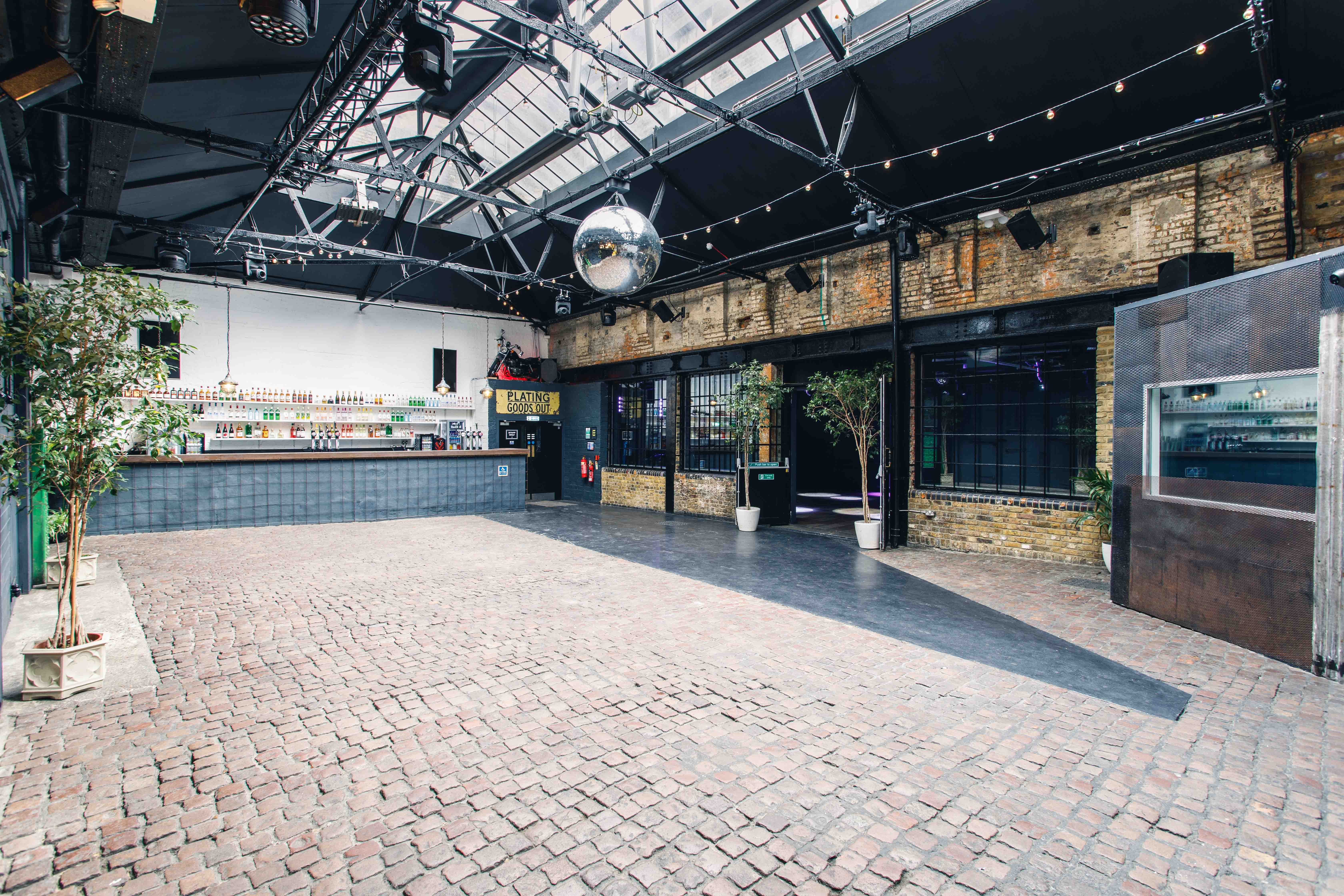 Spacious industrial venue with exposed brick, perfect for parties and events in Electrowerkz.