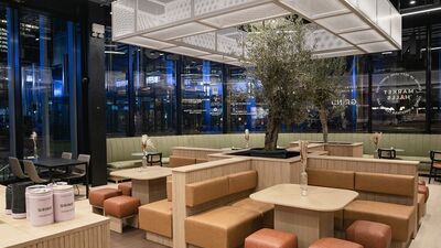 Modern dining space in The Colonnade, Canary Wharf, perfect for casual meetings and events.