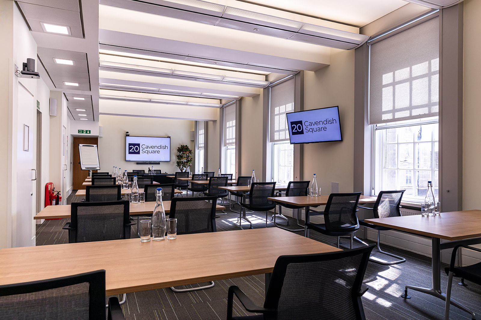 Modern meeting room at 20 Cavendish Square for corporate events, featuring flexible seating.