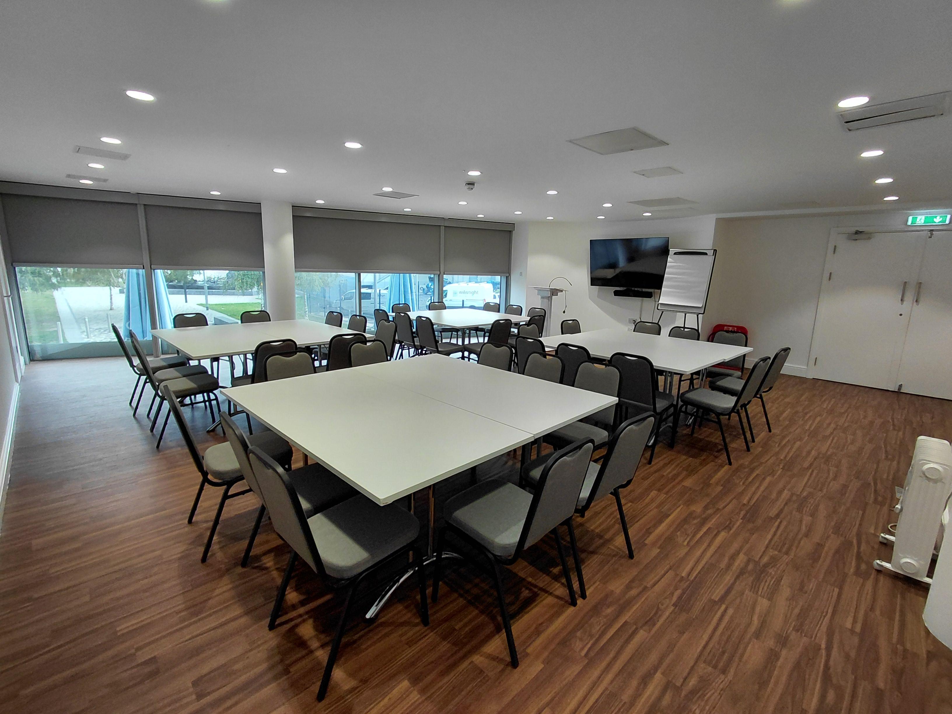 Mezzanine meeting space in London Cable Car, bright and adaptable for workshops.
