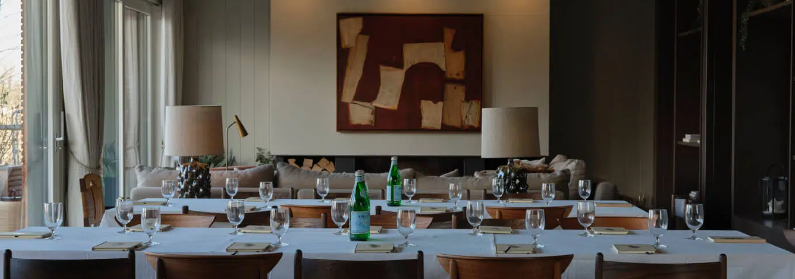 "Meeting room at The Reserve with elegant table setup, ideal for workshops and conferences."