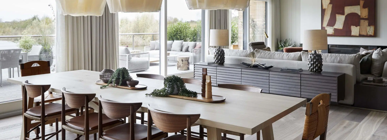 Modern meeting space at The Reserve, featuring a large wooden table in stylish design.