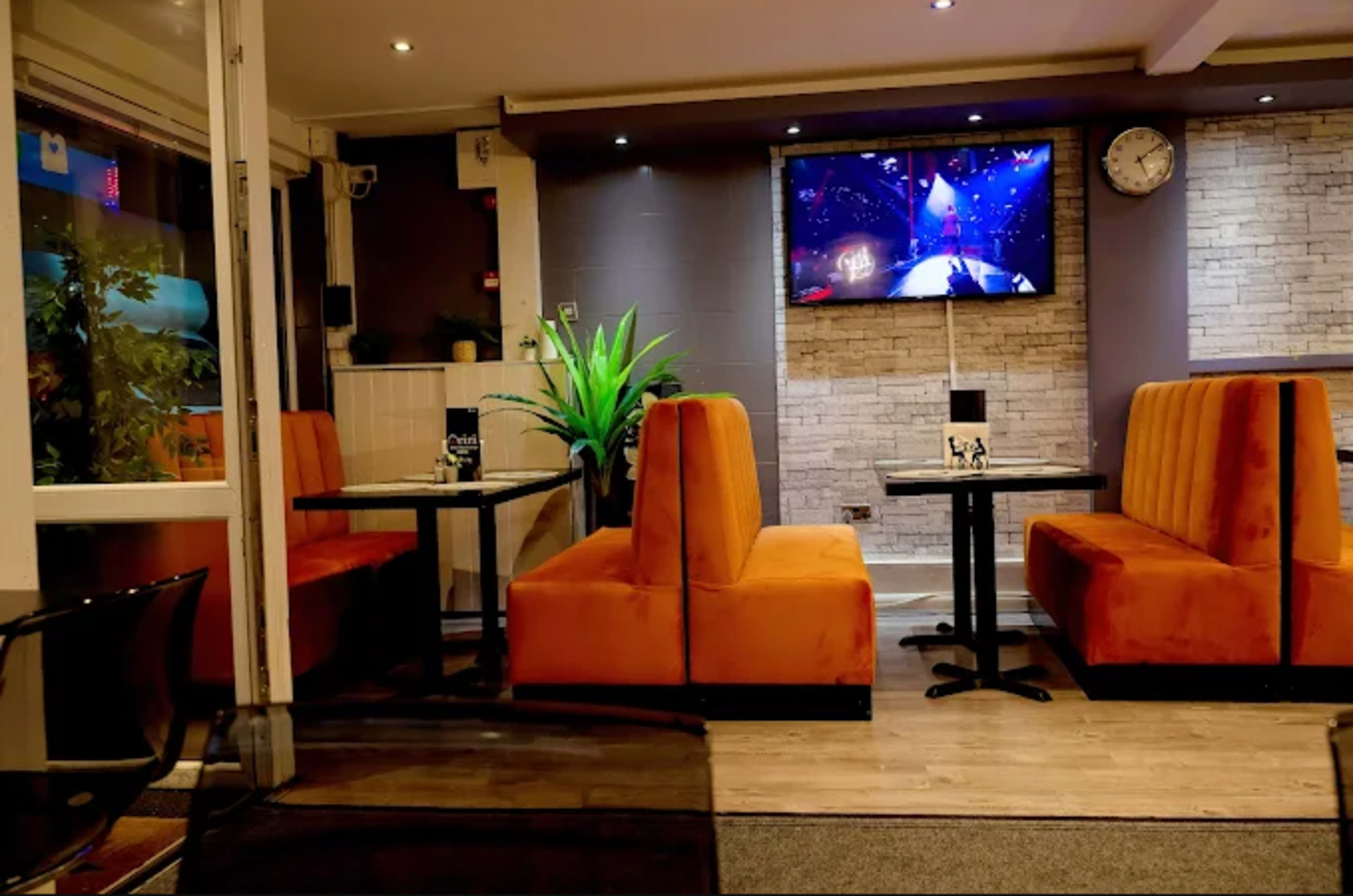 Oriri Lounge booth seating for intimate breakout sessions and casual networking events.