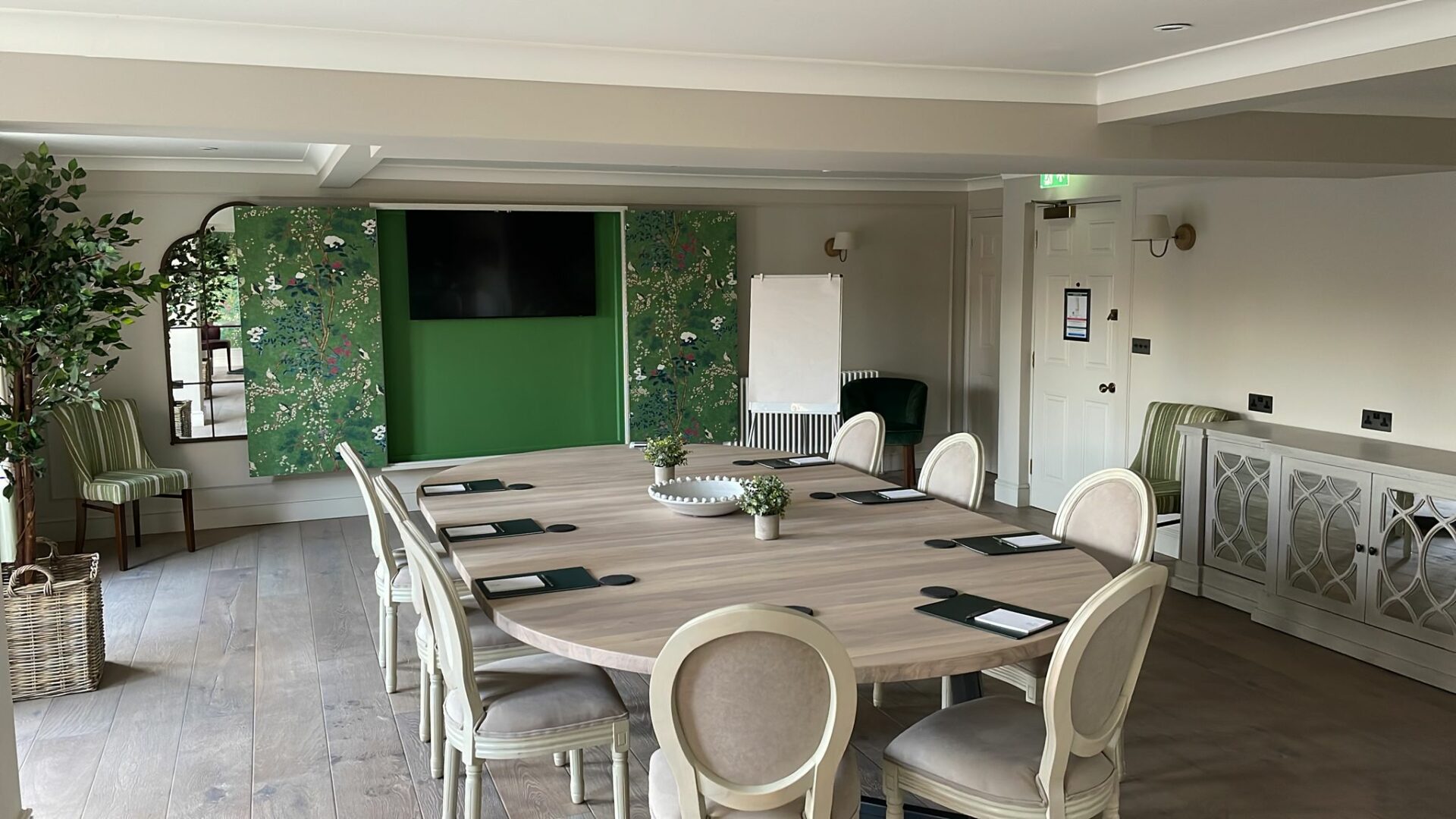 Events Room at Stanwell House with oval table, perfect for workshops and meetings.