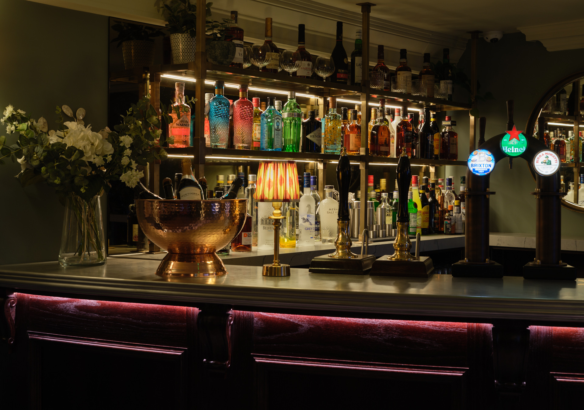 Salt Bar in Stanwell House with vibrant spirits, perfect for socializing events.