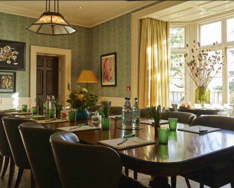 The Scullery meeting room at Lime Wood, featuring elegant decor and natural light.