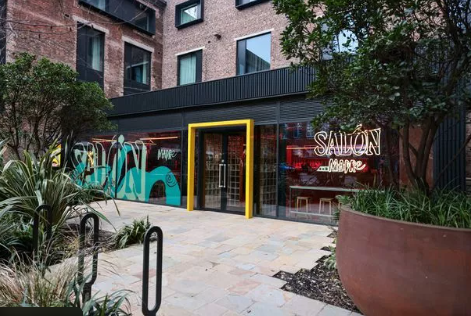 Vibrant Salon Madre venue with modern design, perfect for meetings and events.