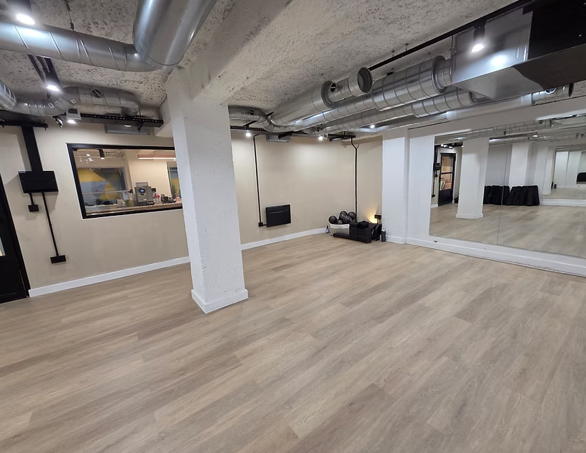 Versatile studio hire at London Academy of Dance with polished wooden flooring for events.