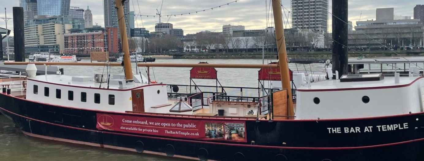 Unique boat venue for events with city backdrop - perfect for gatherings and rentals.