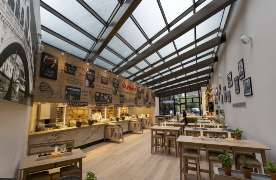 Modern dining space at Vapiano, Tottenham Court Road, ideal for networking events.